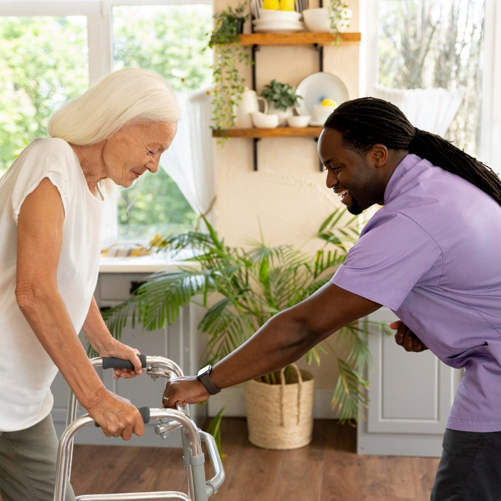 An occupational therapist helping an elderly woman walk with a walker