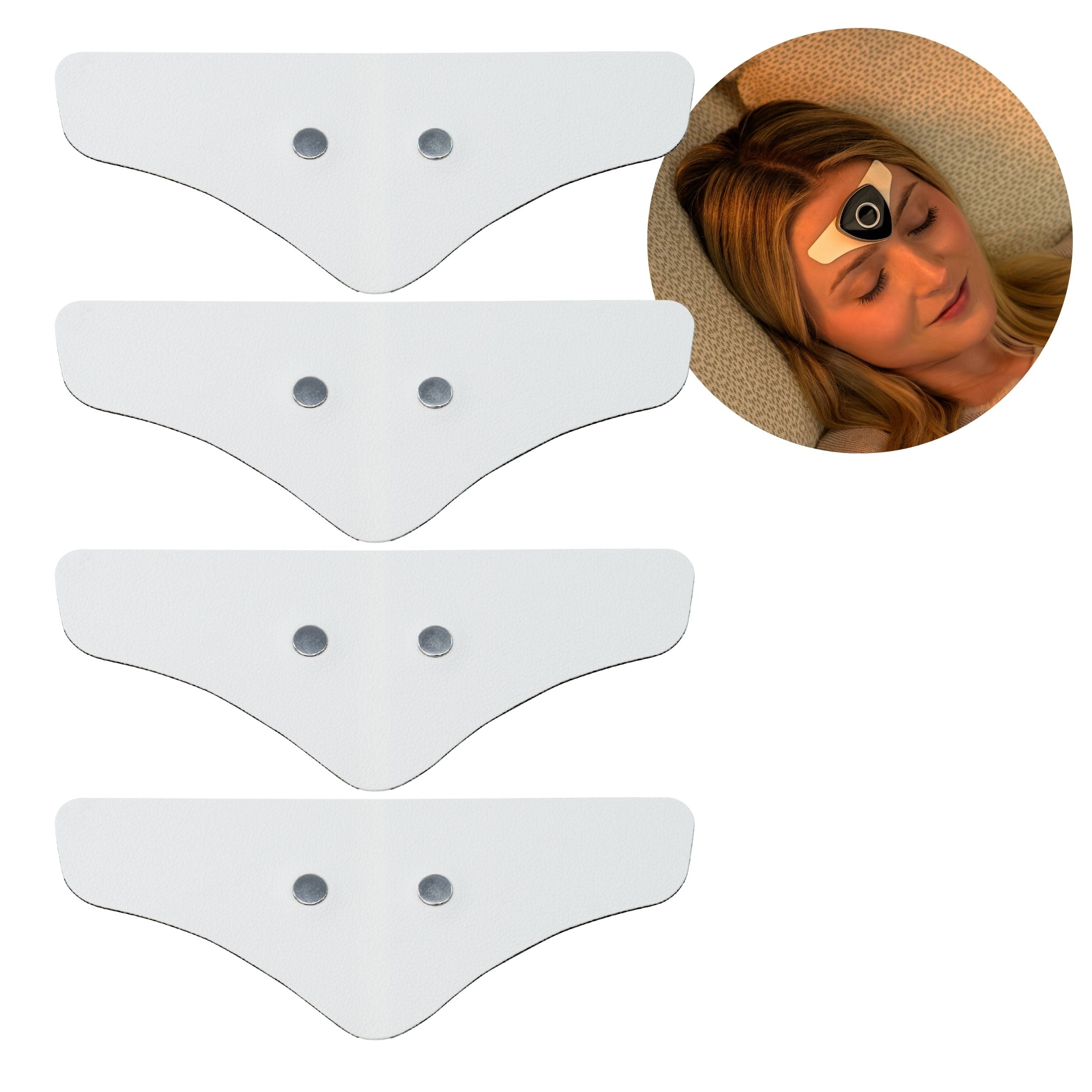 White adhesive patches on a white background with a close-up of a person wearing one.