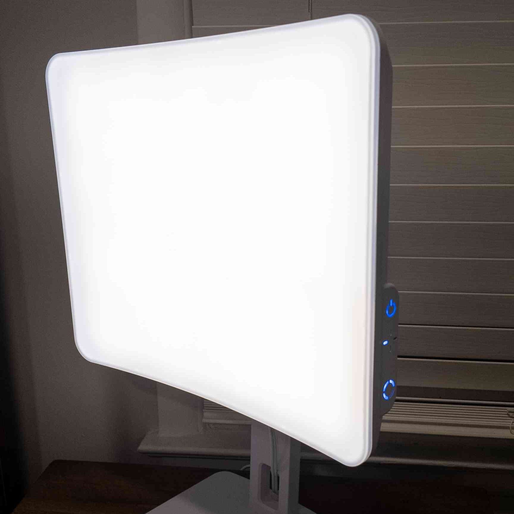 Day-Light Elite Light Therapy Lamp on a desk