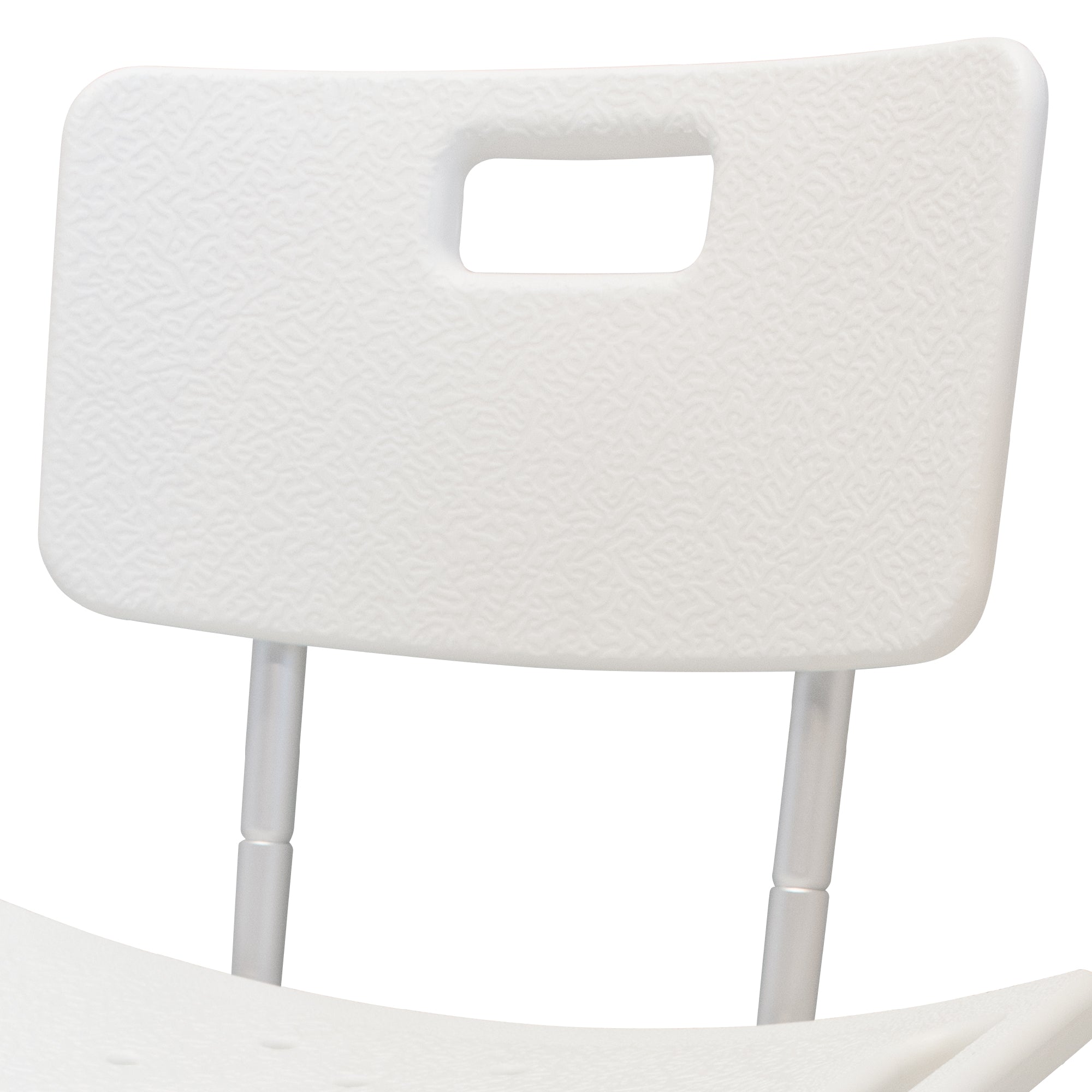 The back support of a white shower chair